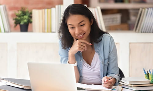 Female university student studying hybrid